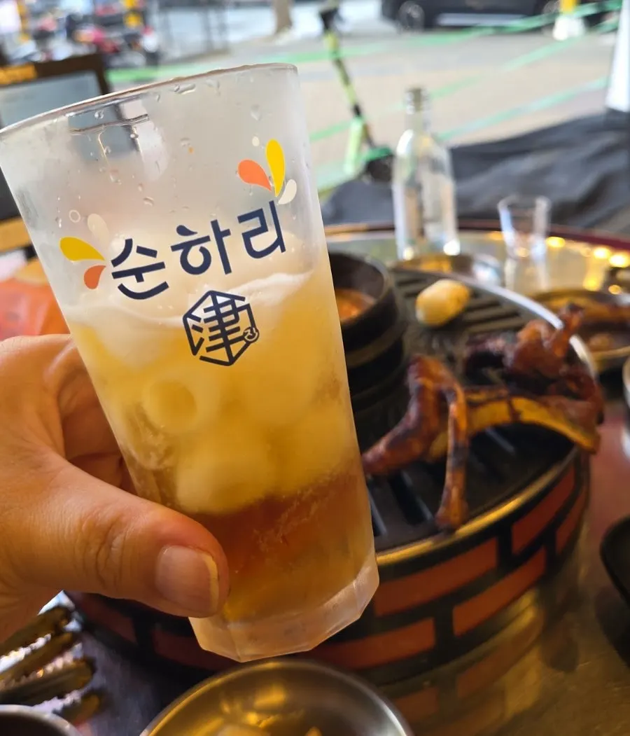 Table with jjokgalbi and drinks together