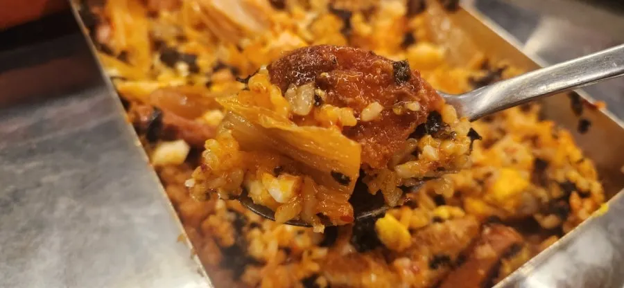 Inside of the lunchbox after shaking with kimchi