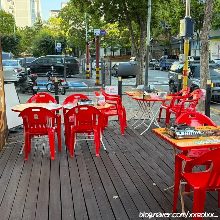 Outdoor tables in front of the restaurant