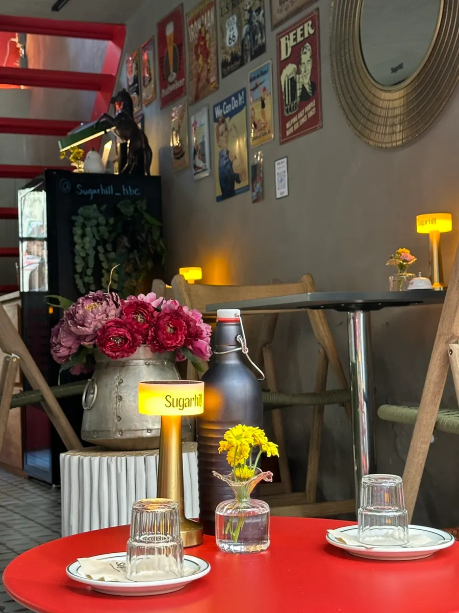 Seating at Sugar Hill with standout lighting and table settings