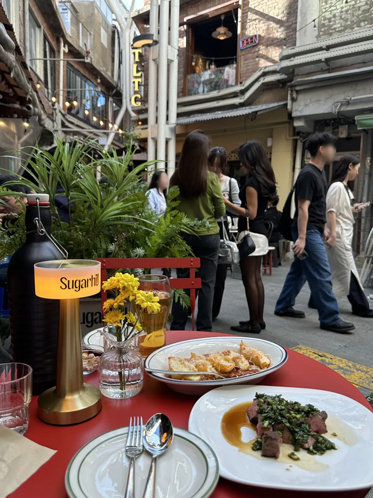 View of Sugar Hill's terrace in Sinheung Market, Haebangchon