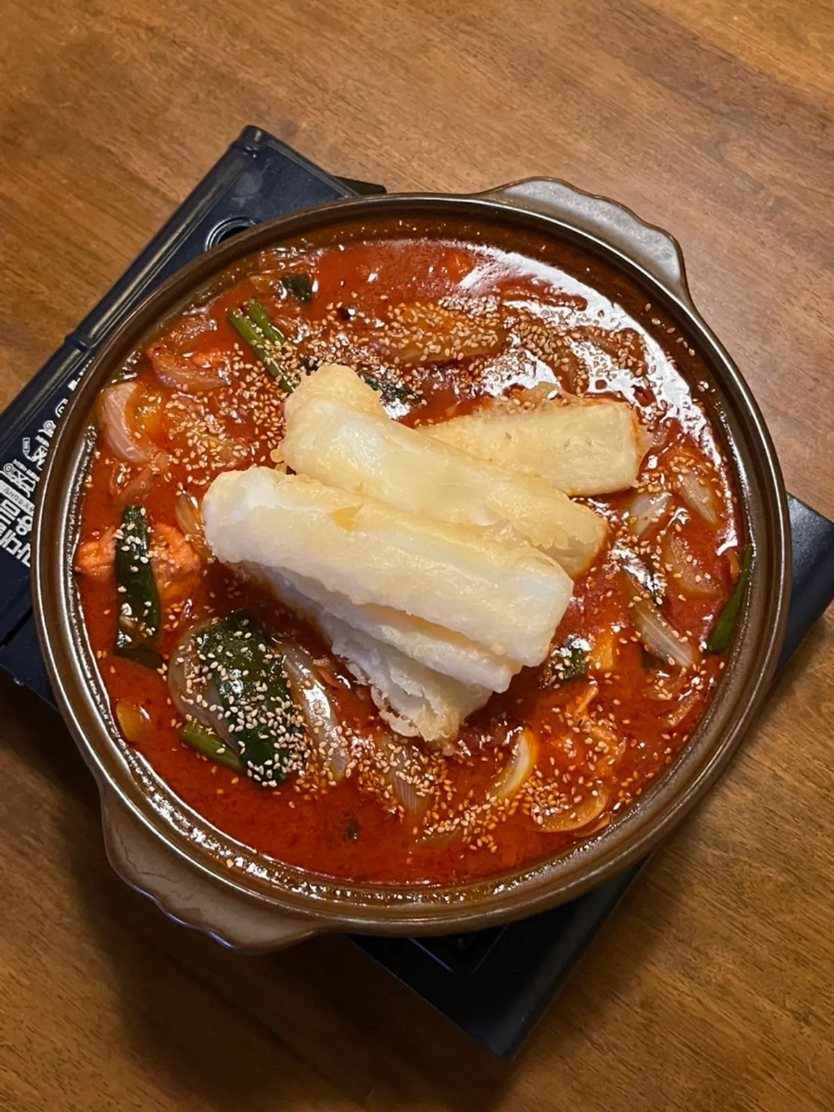 A pot of domestic boneless dakdoritang served at the table