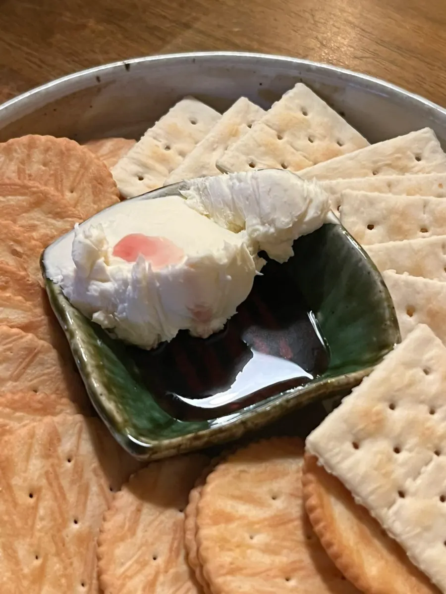 Homemade cream cheese spread on a cracker