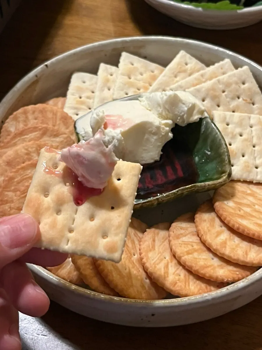 A few remaining pieces of cream cheese crackers