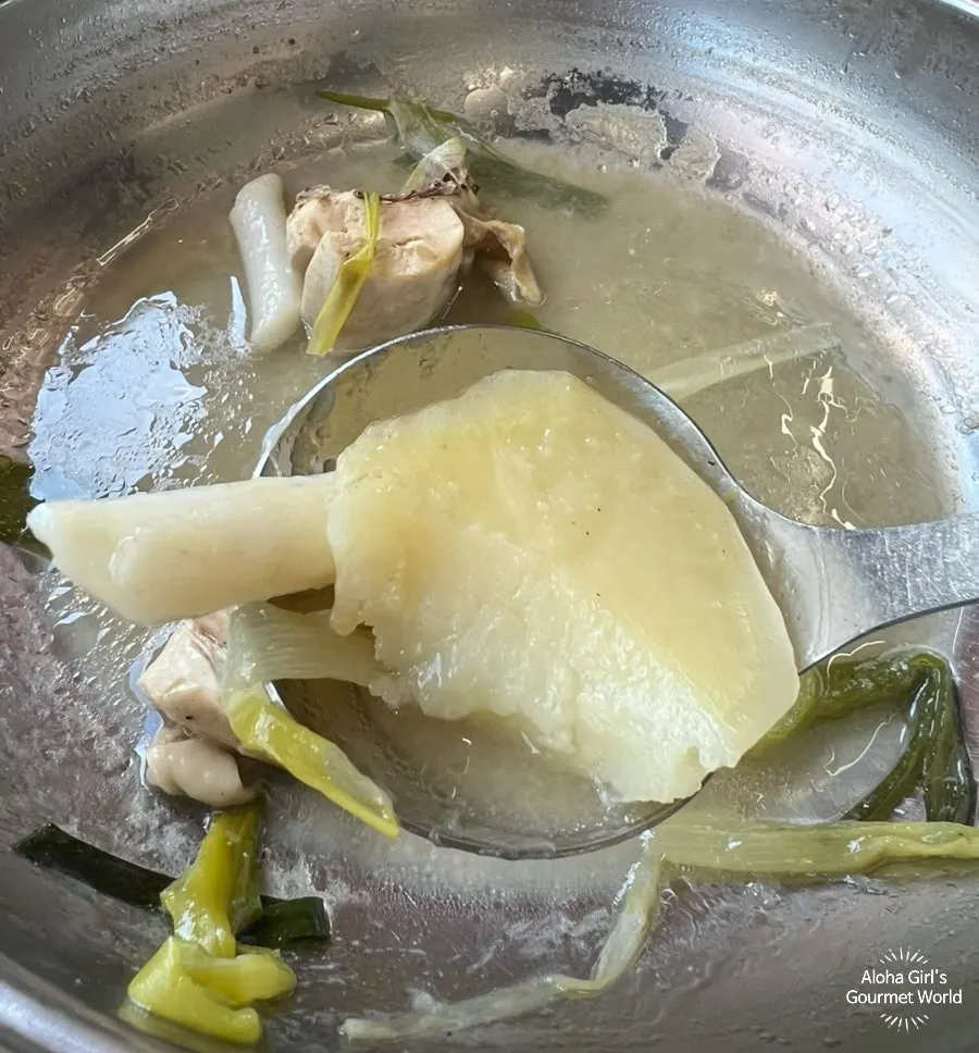 Potato and rice cake add-ons fished out of the broth