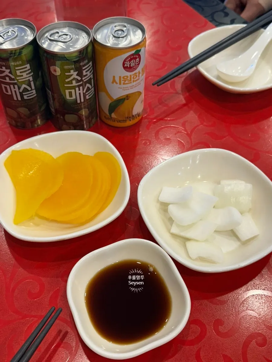 Complimentary green plum and pear drinks