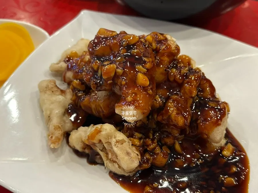 Table spread with jjamppong-bap and garlic tangsuyuk