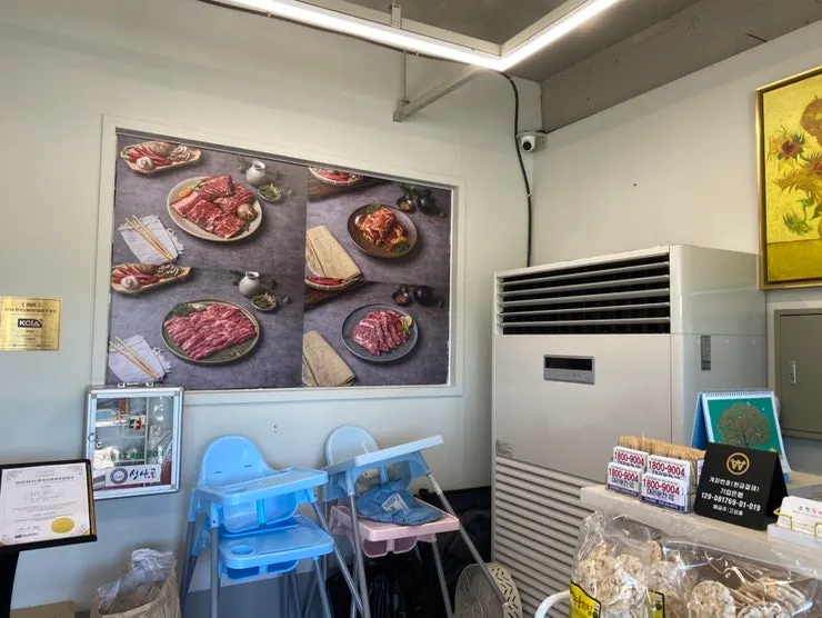 Kids' chairs and dishes prepared at Sujeong Galbi