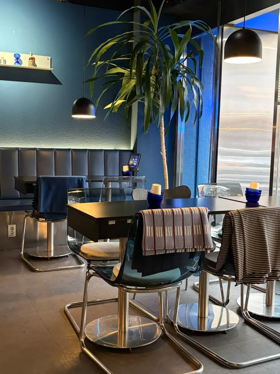 The softly lit atmosphere at Bacha Suji after dark