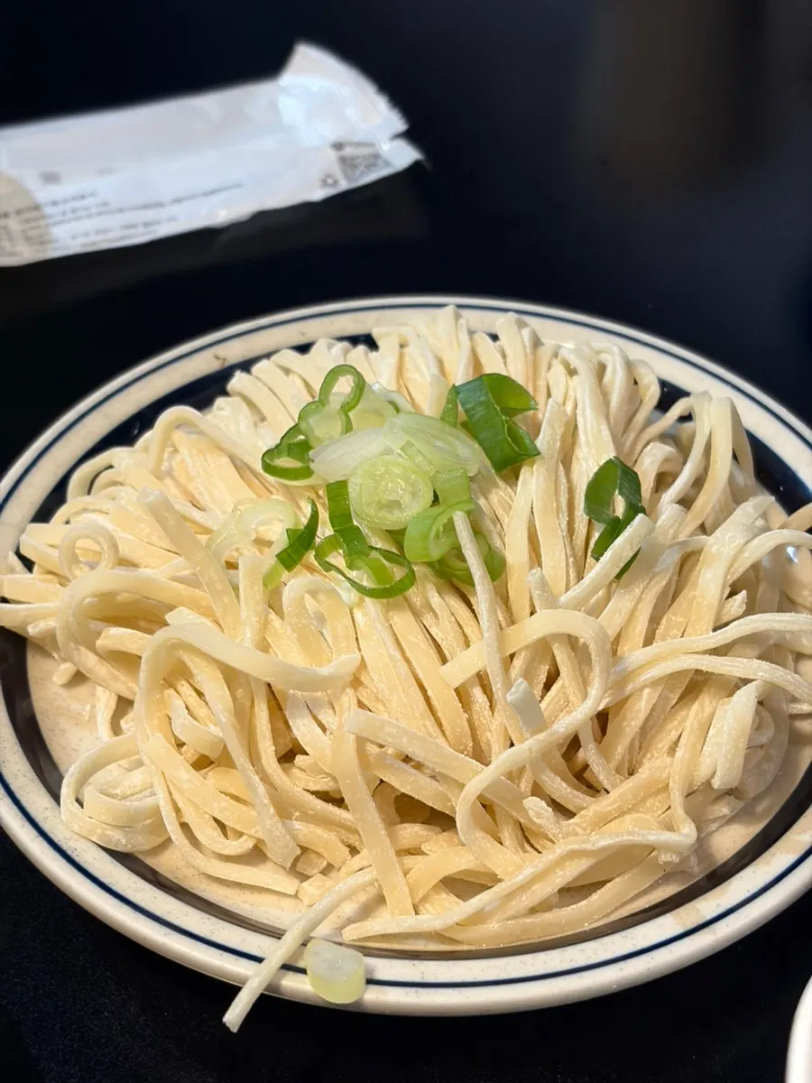 Kalguksu noodles ready to go into the refreshing, rich broth