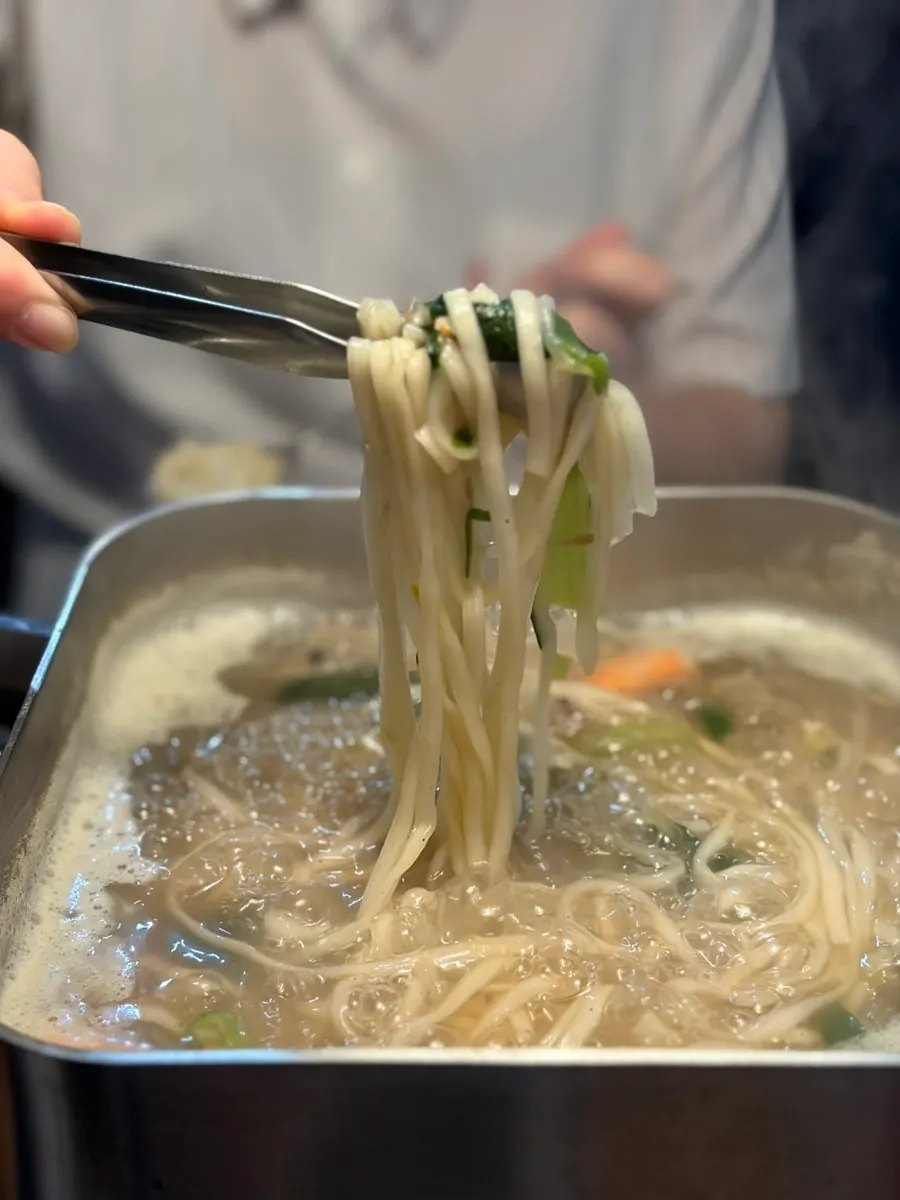 Springy kalguksu noodles with seafood broth