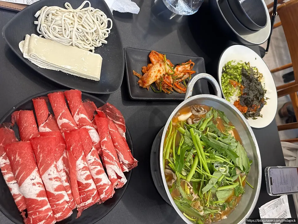 House-made kalguksu noodles and flat kalguksu served side by side