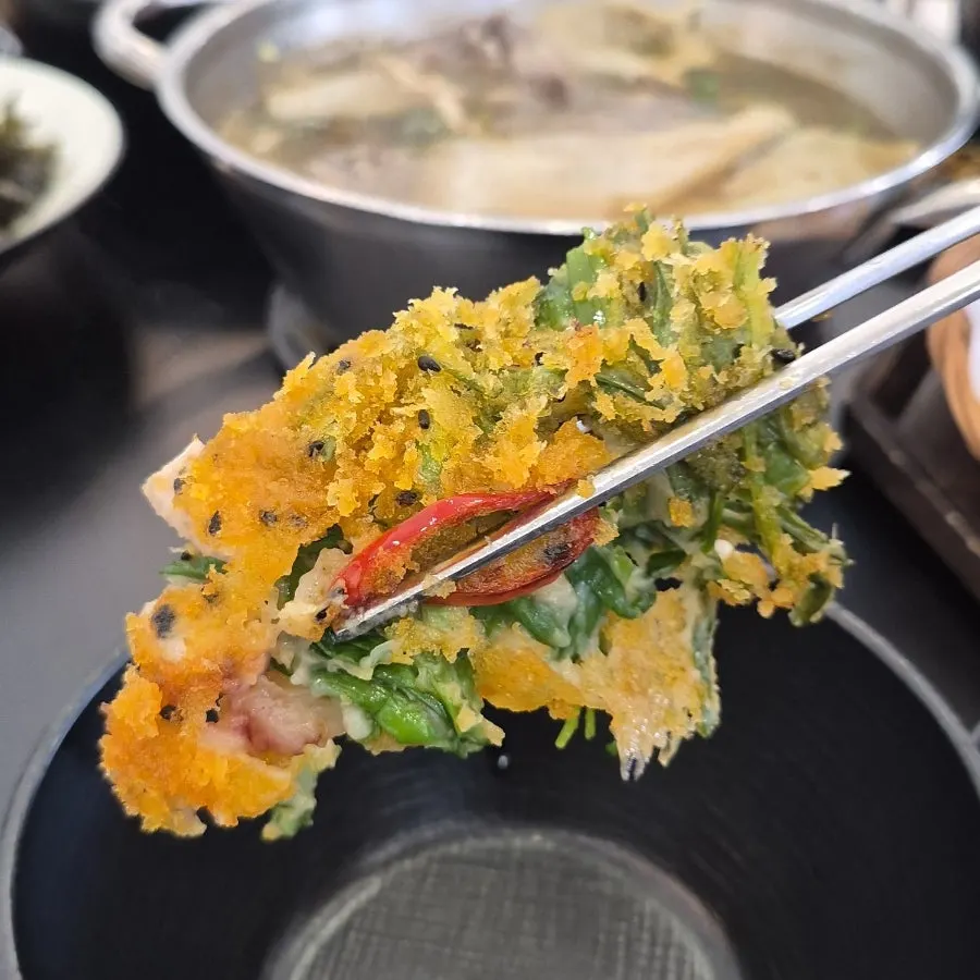Piece of pajeon showing squid and shrimp