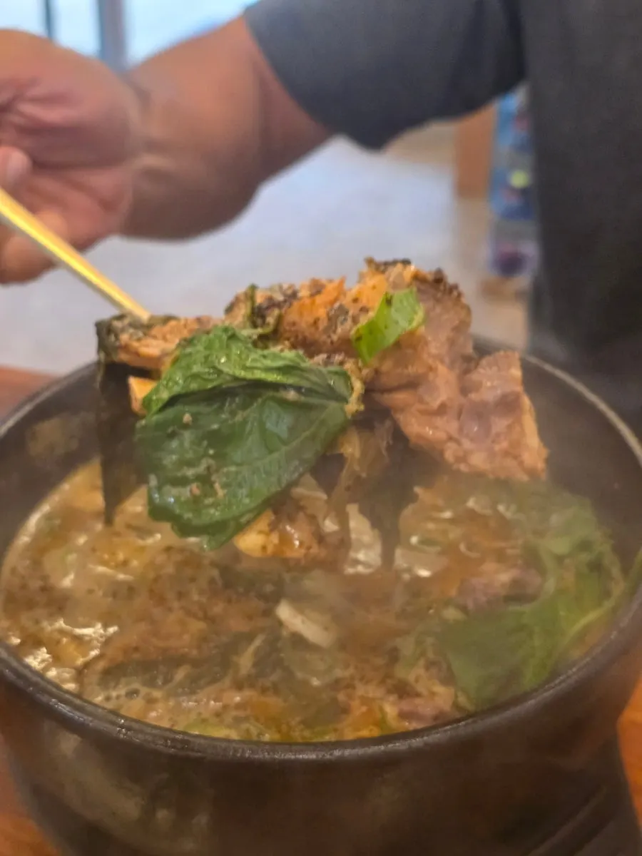 Scooping up a spoonful of sesame sundaeguk