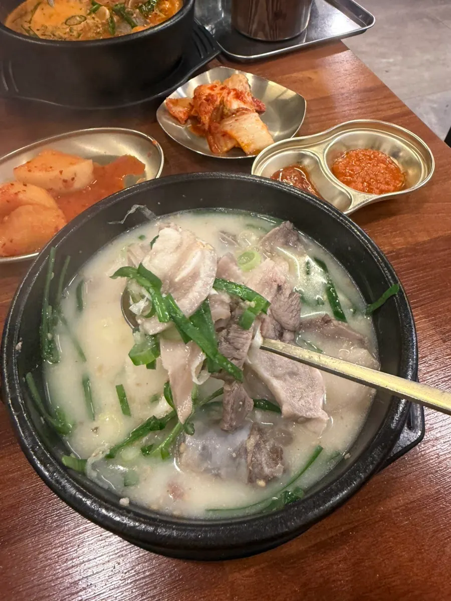 Sundaeguk broth topped with chives and perilla seed powder
