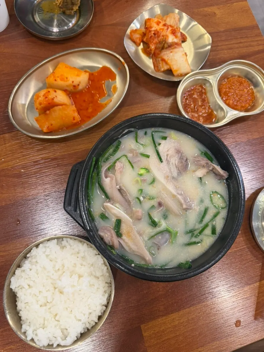 Takeout discount signage with a generous spread of soup