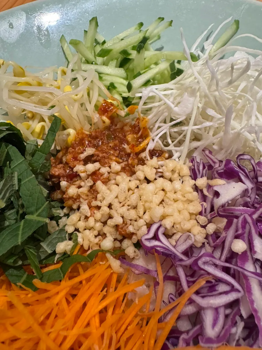 Gogi Soboro Bibimbap being mixed together