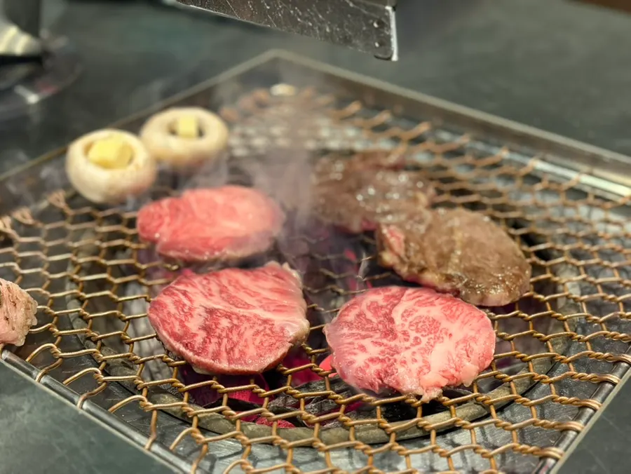 Korean beef sirloin cooking over charcoal