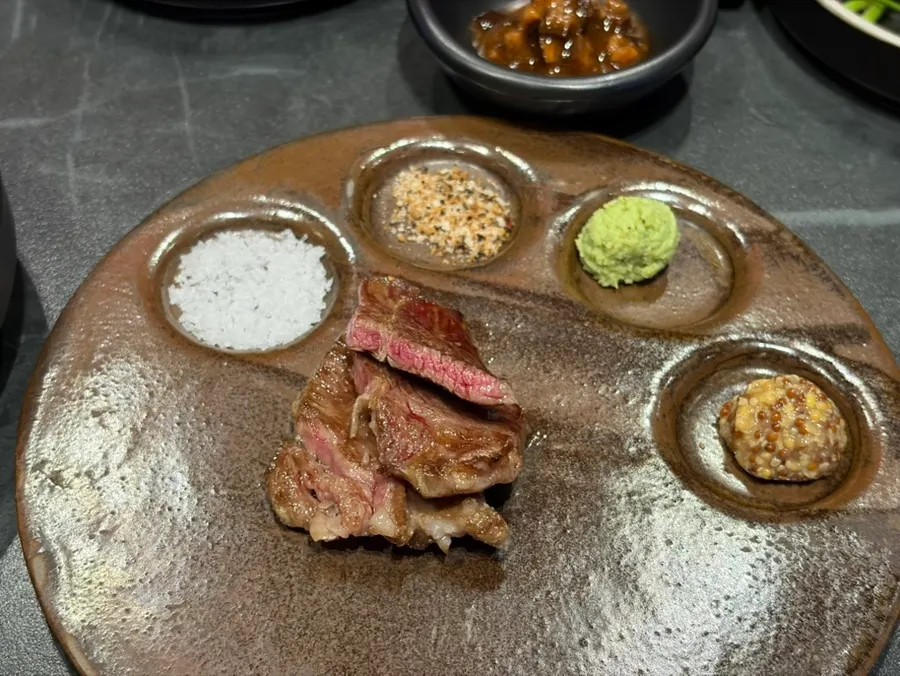 Meat grilled by staff and served on an individual plate