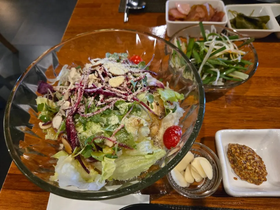 Side dishes including salad and scallion salad