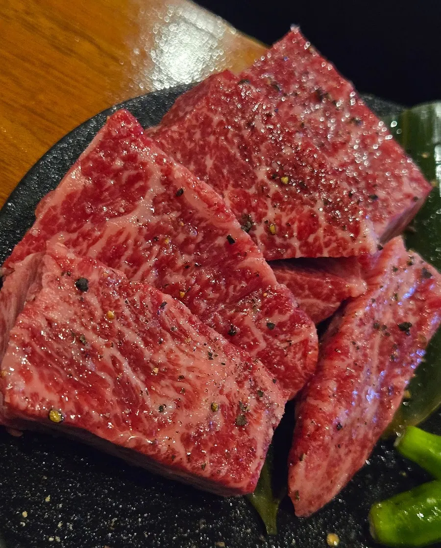 Raw aged sirloin with visible marbling