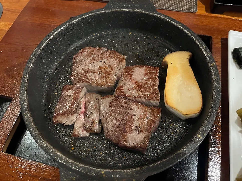 Staff grilling the striploin