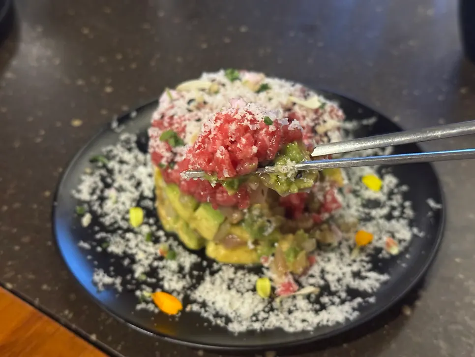 Avocado hanwoo tartare topped with grana padano