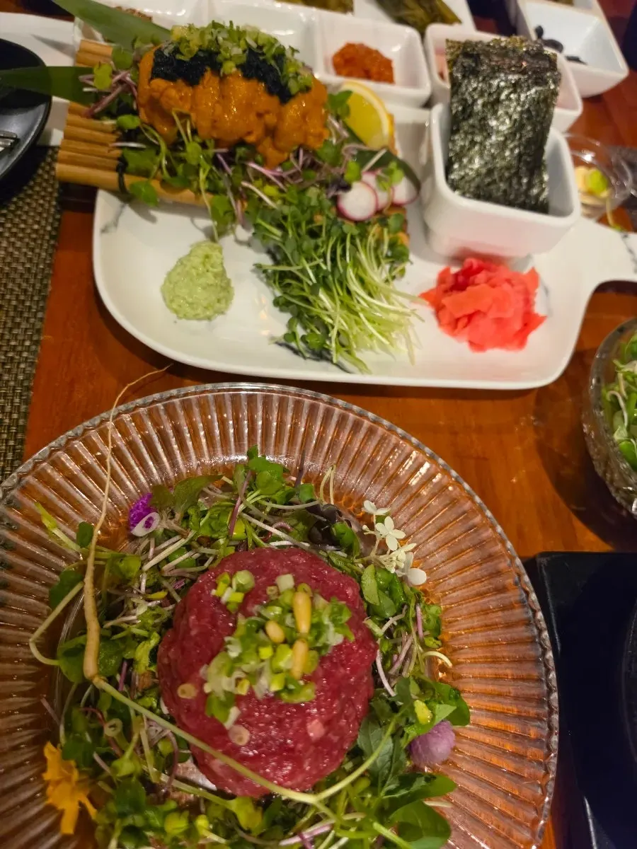 Plate of hanwoo yukhoe tossed in seasoning