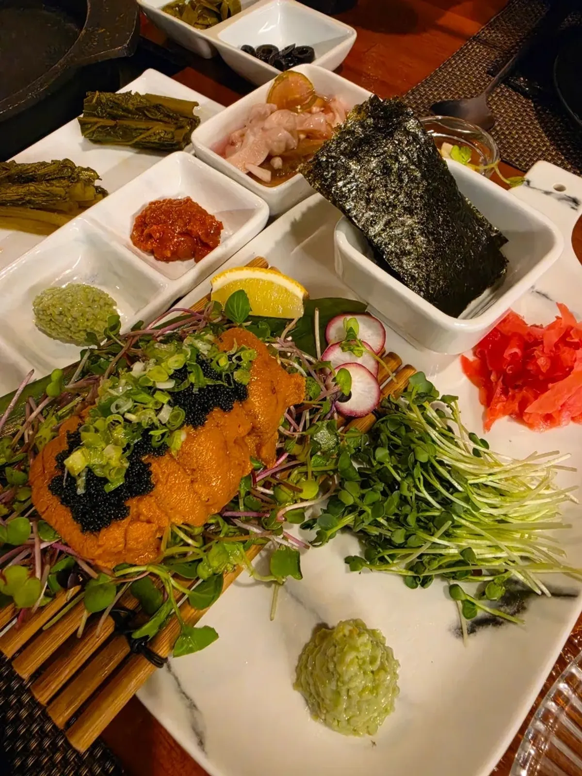 A piece of aged hanwoo served with uni