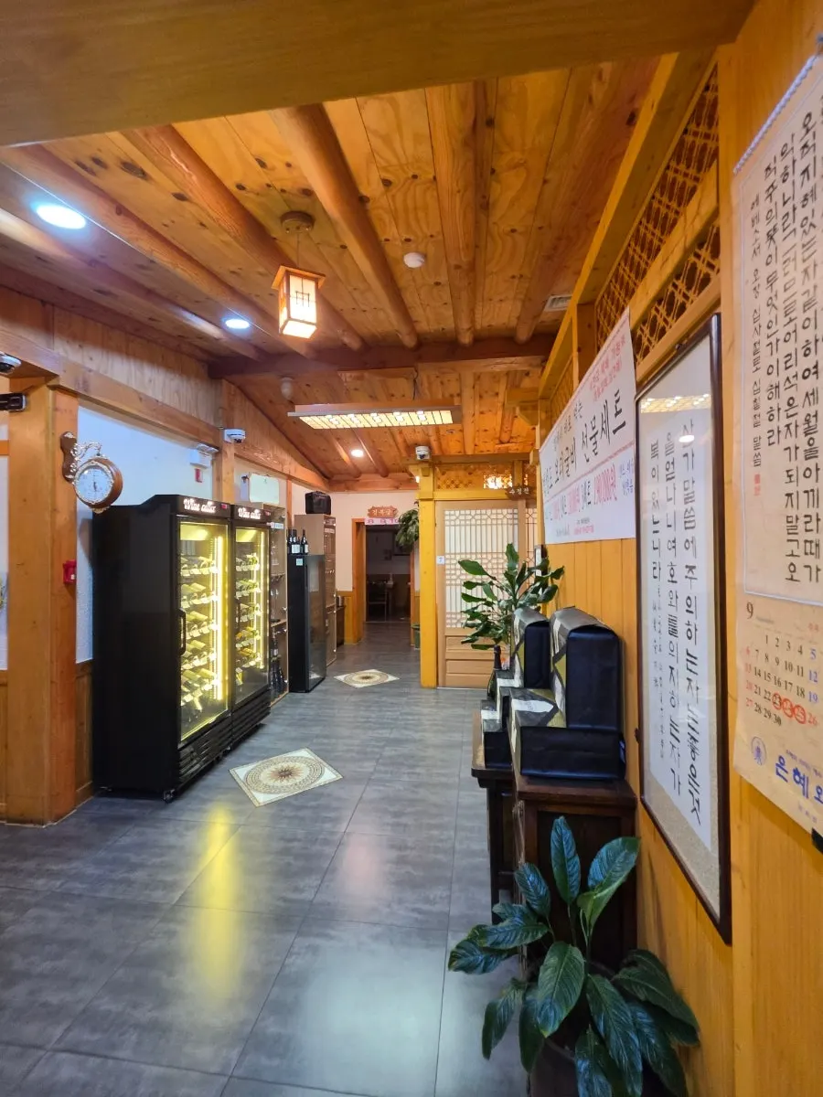 Wines including Dom Pérignon displayed at Suksudaega's entrance