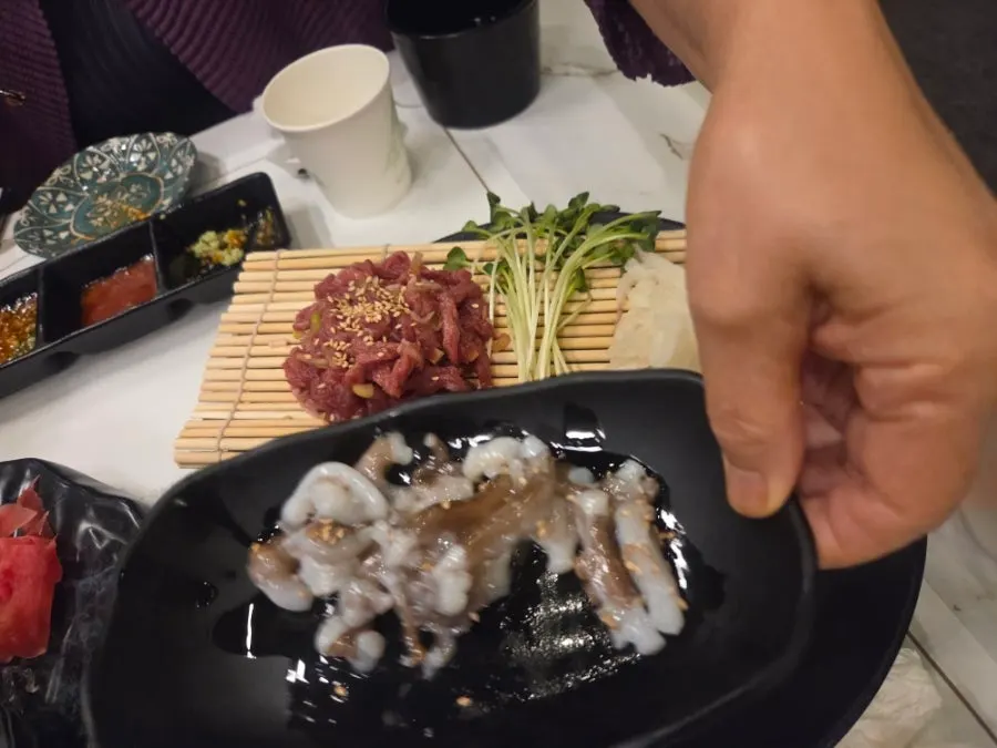 Haeseon aged sashimi and chopped live octopus