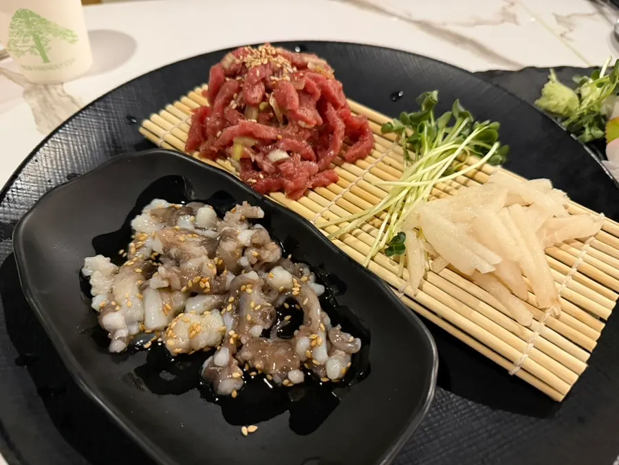 Live octopus beef tartare included in the course