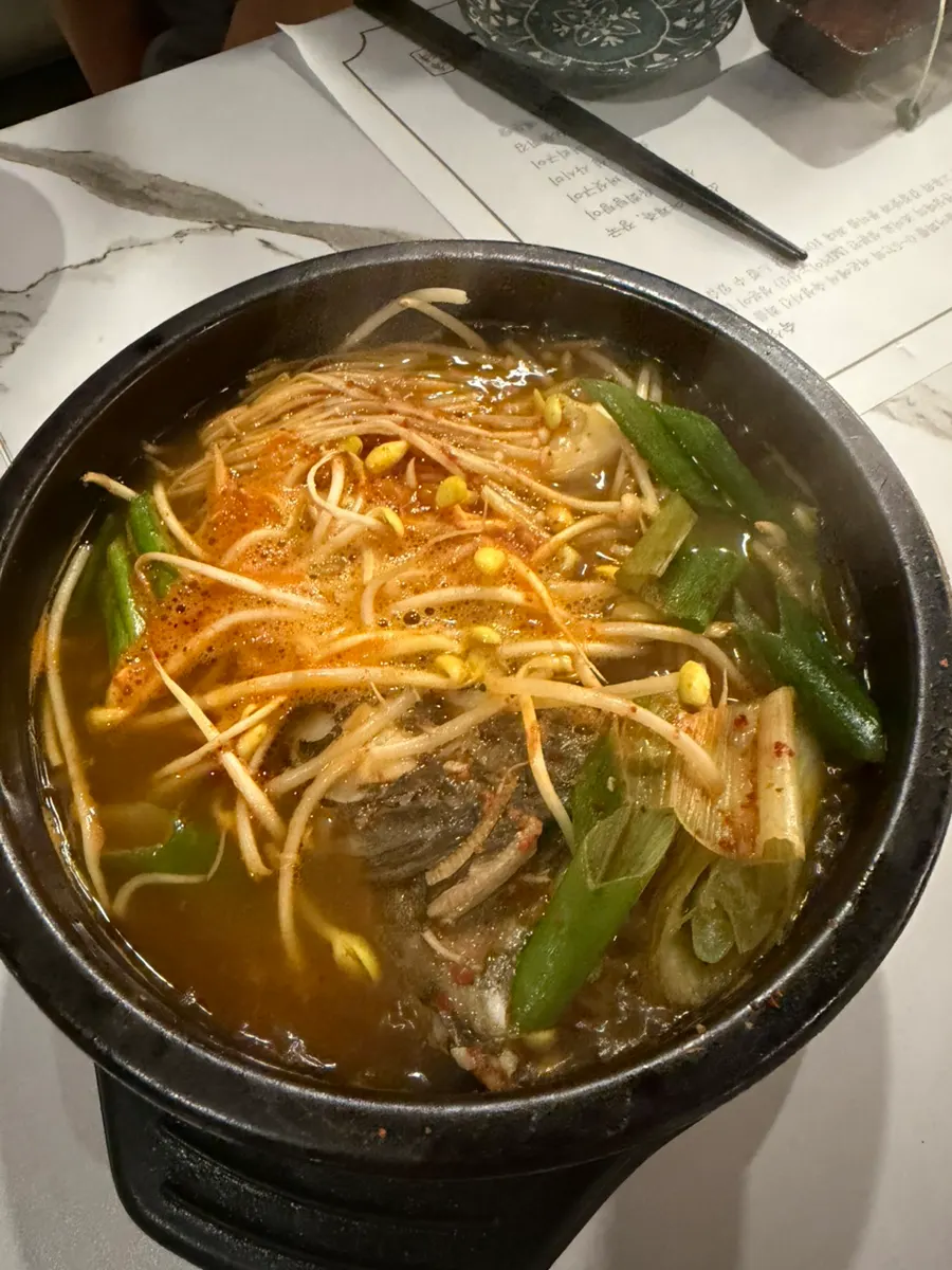Bean sprout and fish head ttukbaegi spicy fish stew