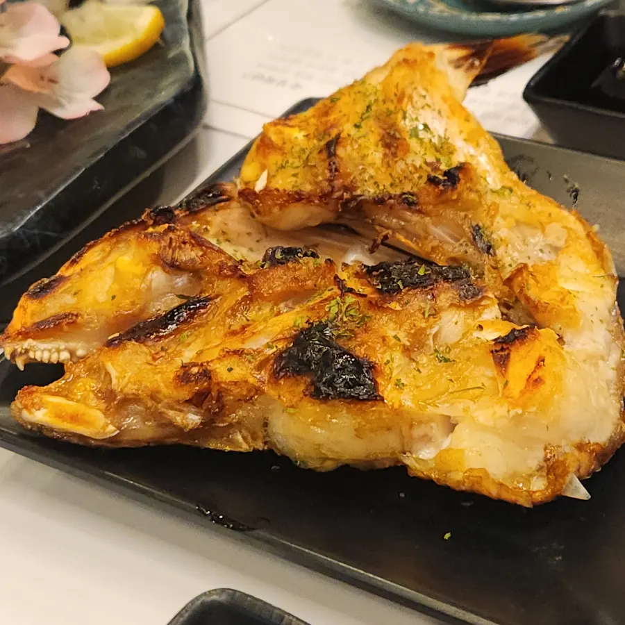 Grilled sea bream head packed with meat