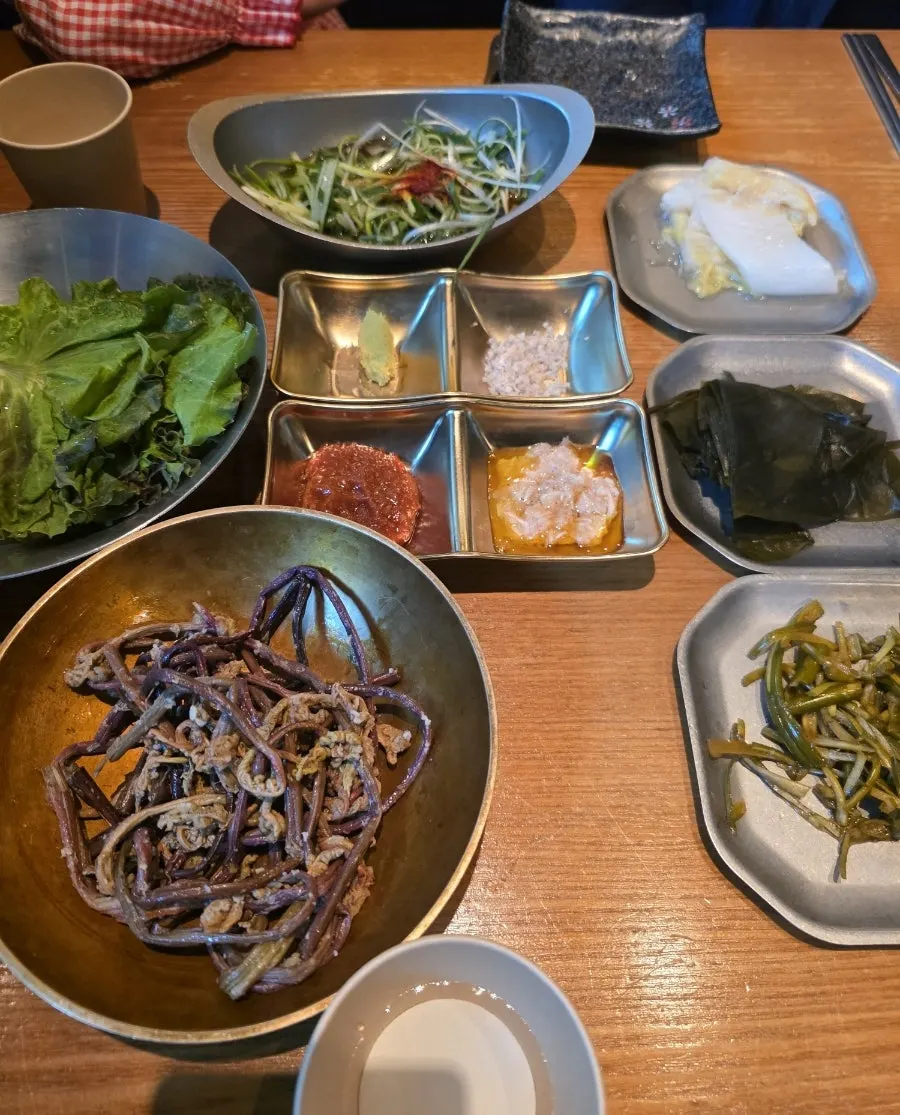 Jeju-style banchan served on stainless steel tray