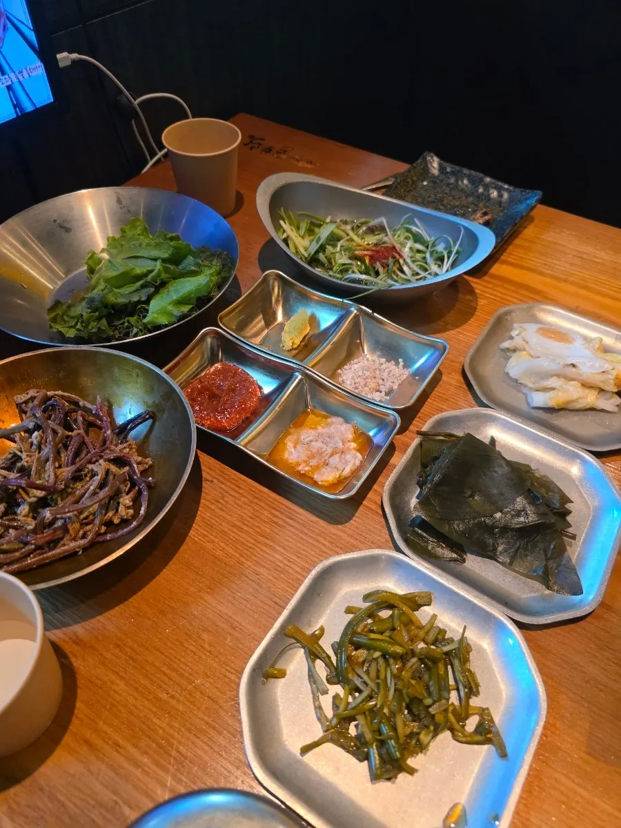 Assorted dipping sauces including mel-jeot and salt