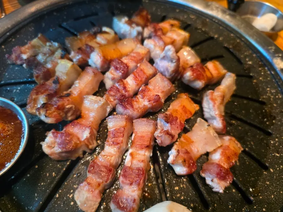 Black pork belly grilled golden brown over charcoal