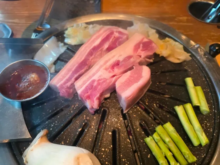 Black pork grilling on the charcoal grill