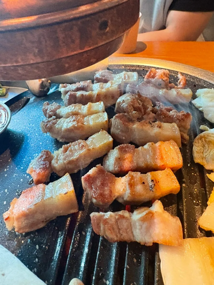 Seafood doenjang stew with a bowl of rice