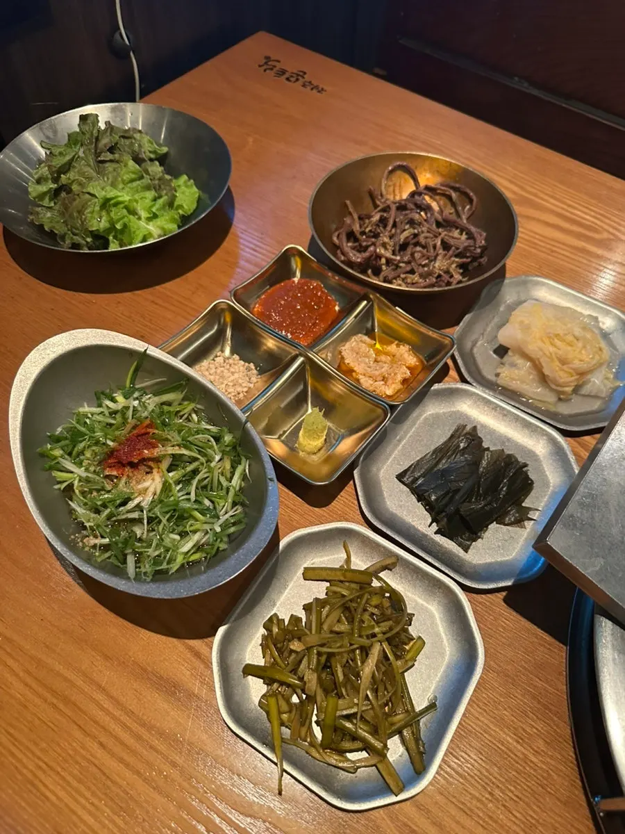 Widely spaced tables in the Jeju Monteurak dining hall