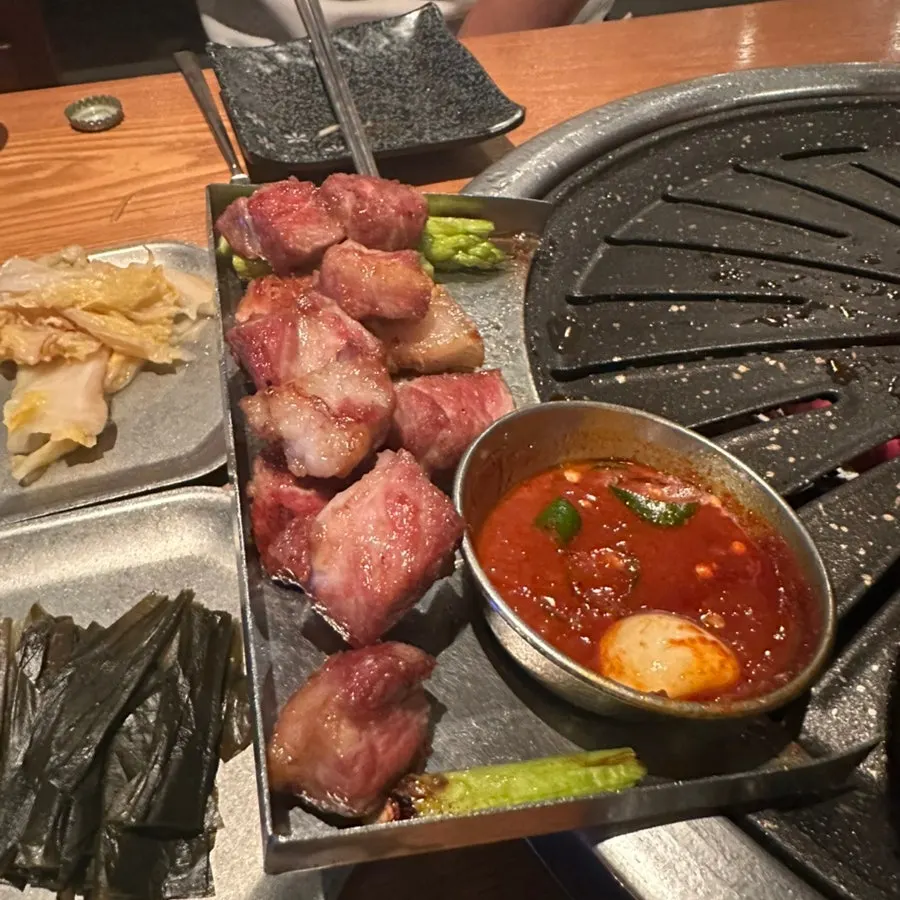 Cross-section of black pork mokssal grilled golden on the outside