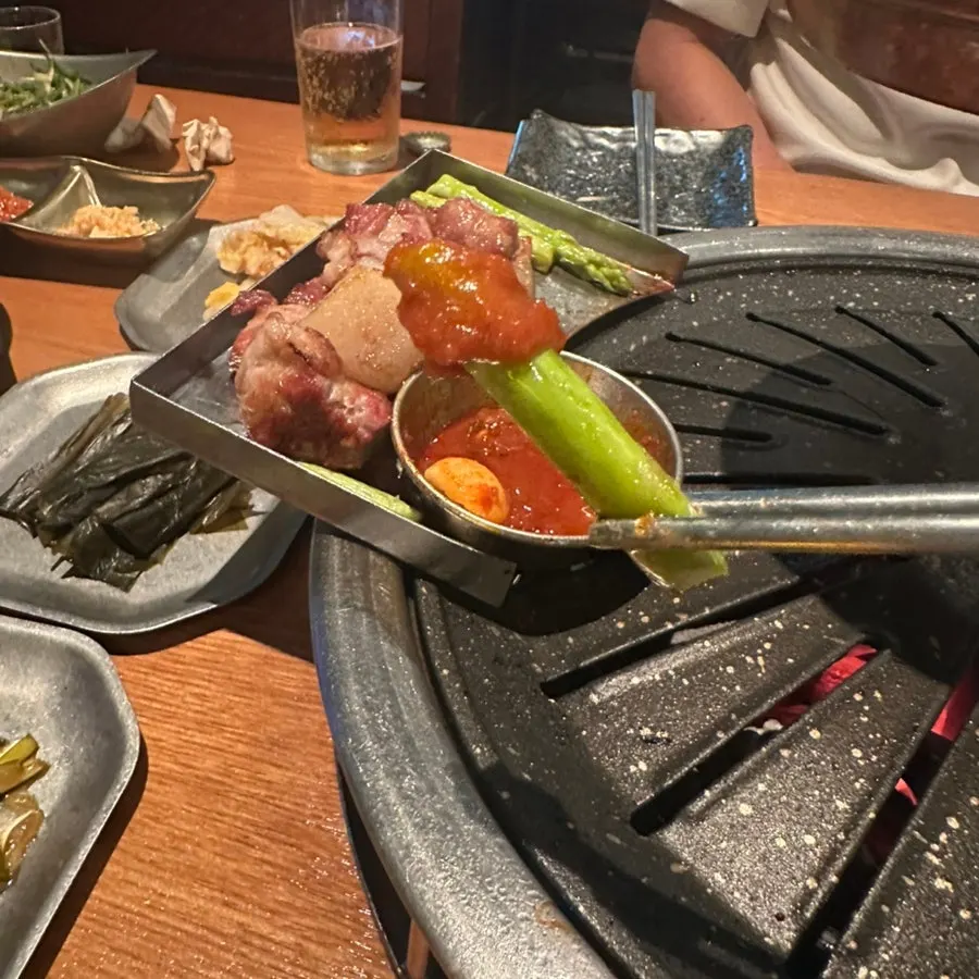 Black pork enjoyed in a lettuce wrap