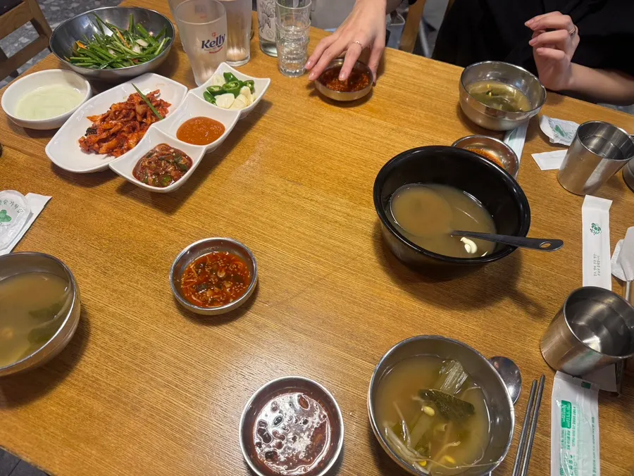 Basic side dishes of chive salad, doenjang soup, and steamed egg