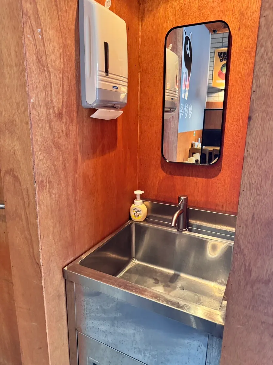 In-store sink for washing hands before wrapping the meat