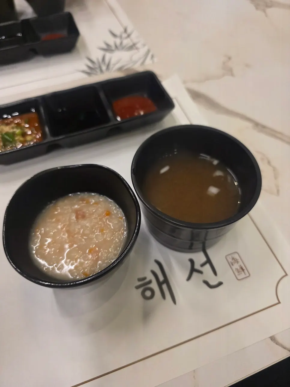 First course dishes: beef vegetable porridge and sea squirt