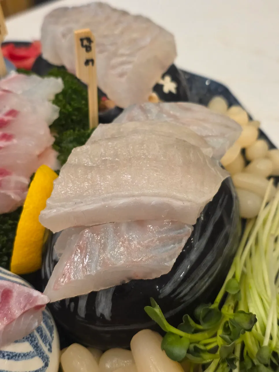 Close-up shot of Haeseon's aged sashimi plate