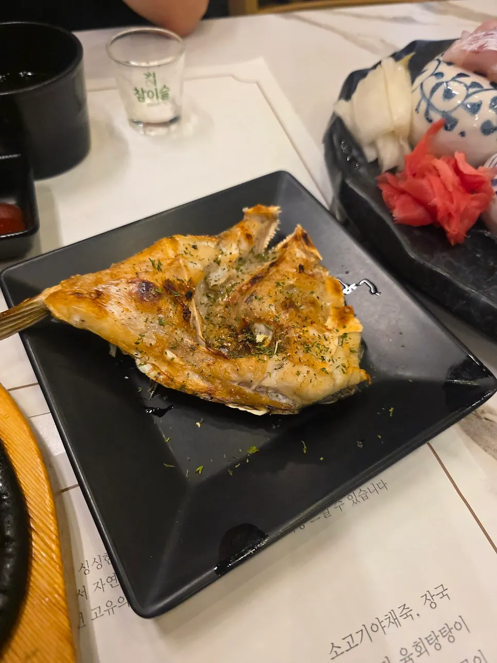 Golden-brown grilled fish head