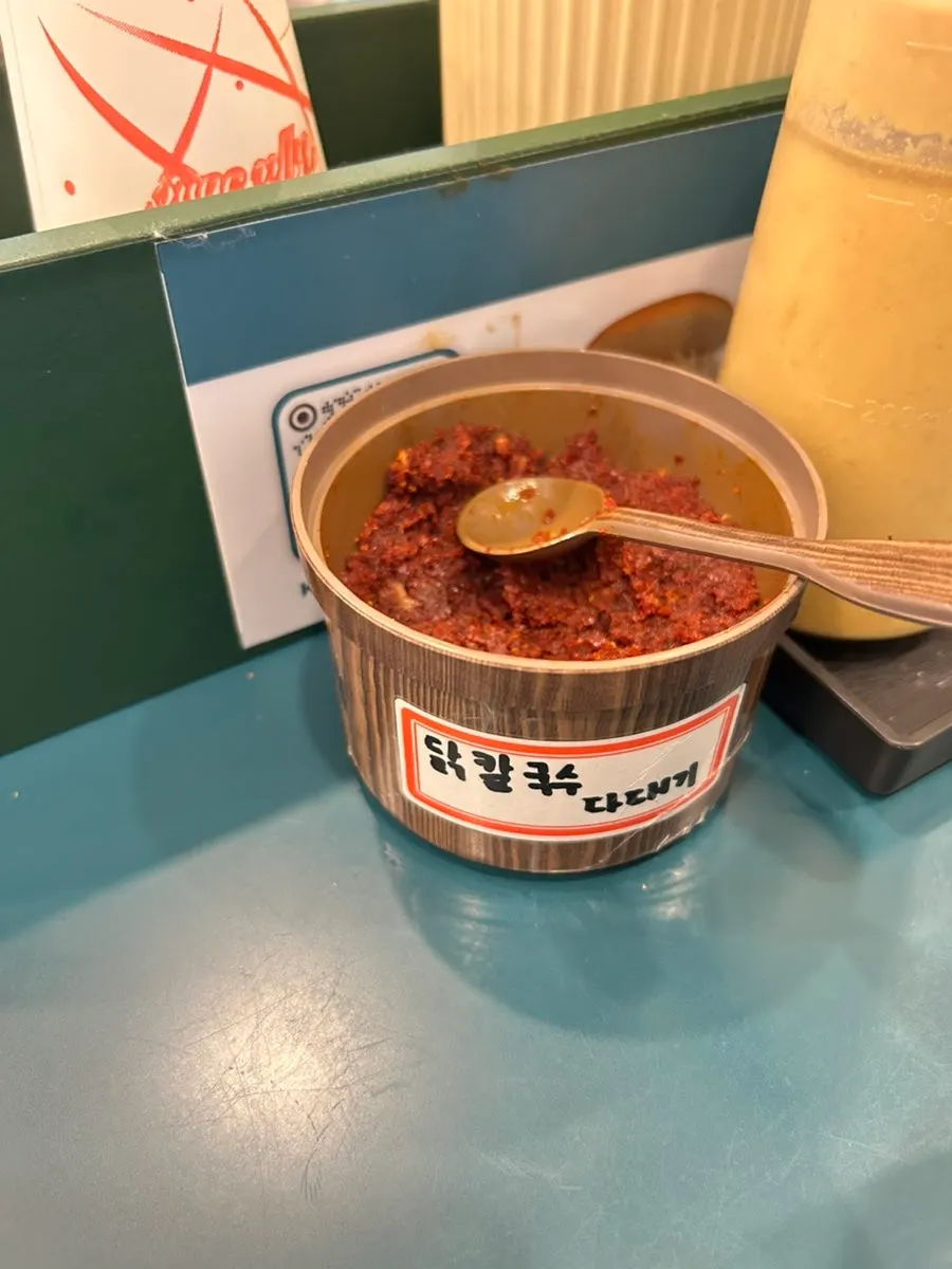 Mustard, vinegar, and spicy relish on the table