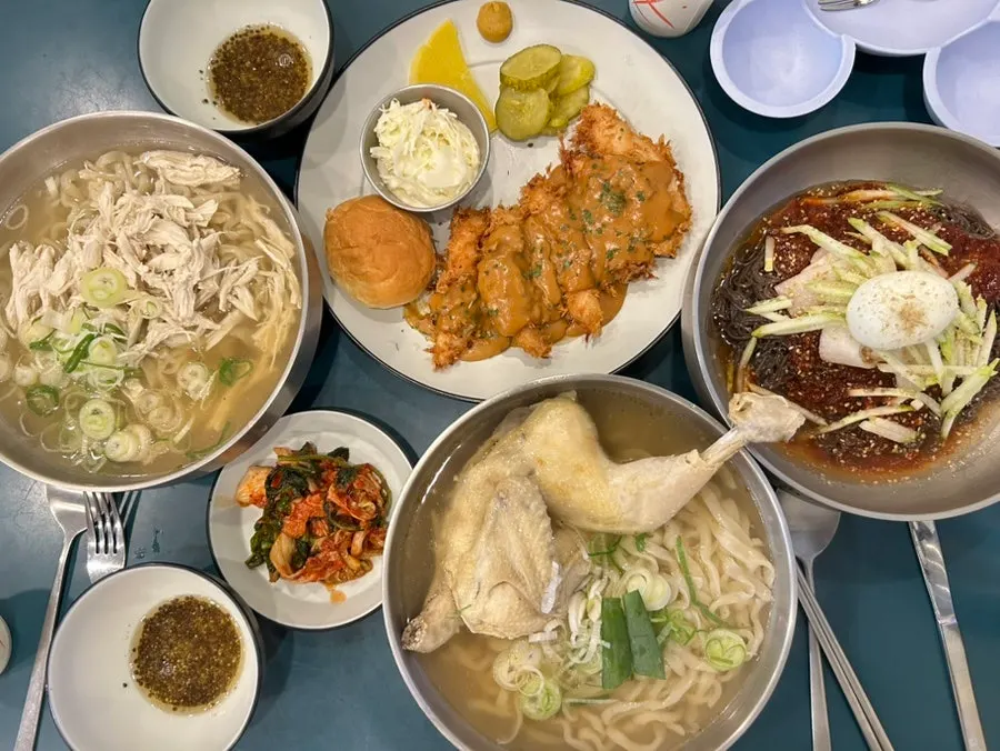 Full spread of kalguksu, katsu, and naengmyeon ordered