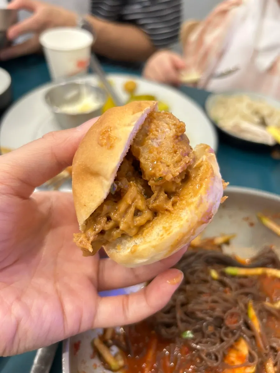 Chicken tenderloin katsu tucked into a dinner roll